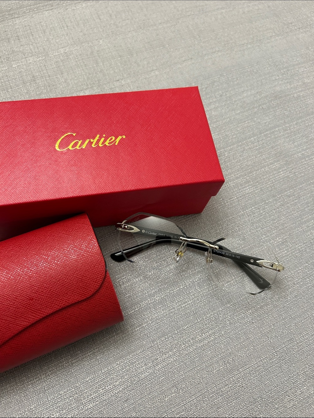 Cartier Rimless Reading Glasses with Black and Silver Accents
